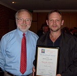 GSTAR-EX user Darrin Nitschke receiving receives a special mention award from Dr.David Malin